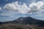 White clouds. blue sky over Mt. St. Helens